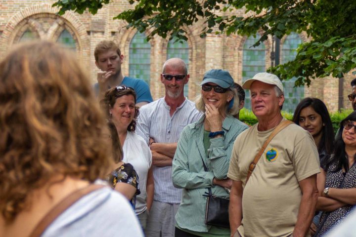 a group of people standing in front of a crowd